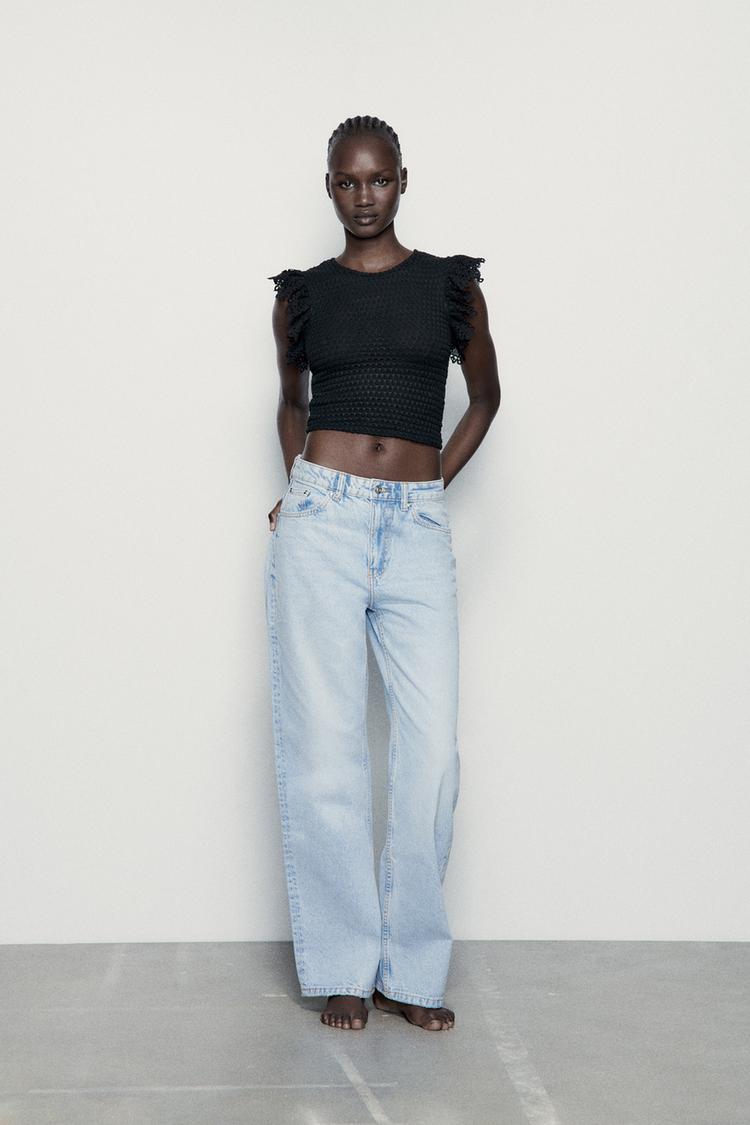 TEXTURED TOP WITH RUFFLE TRIMS