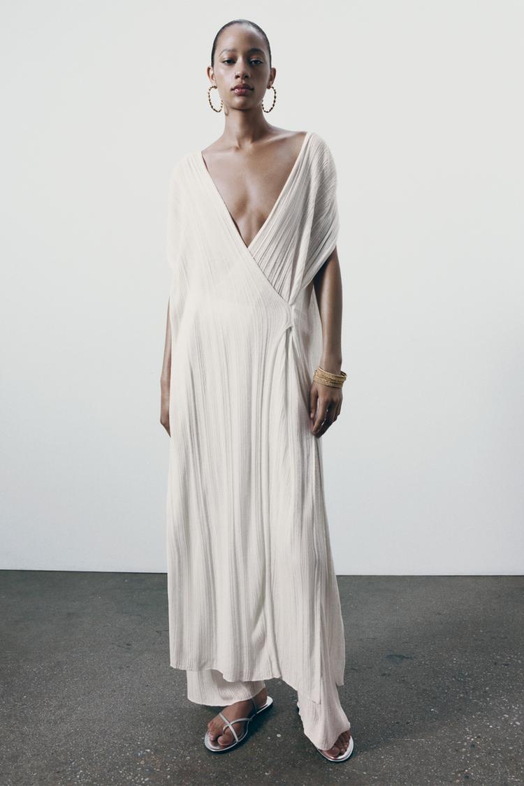 PLEATED KNIT TUNIC DRESS