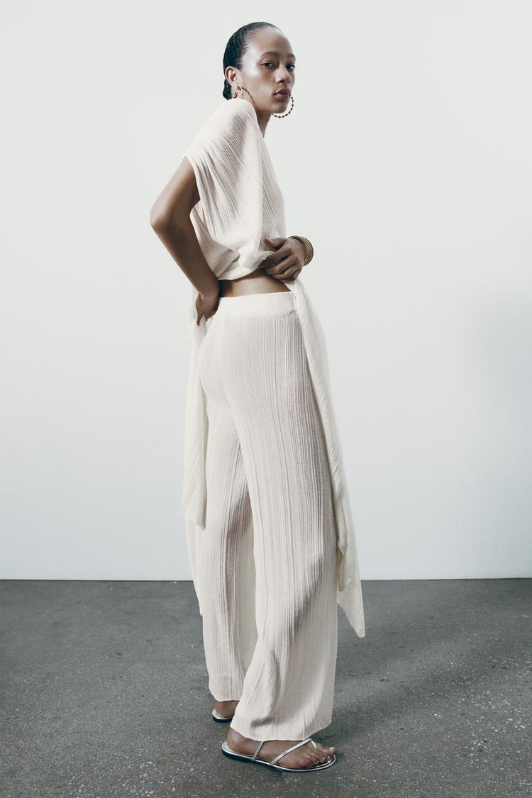 PLEATED WIDE-LEG KNIT TROUSERS