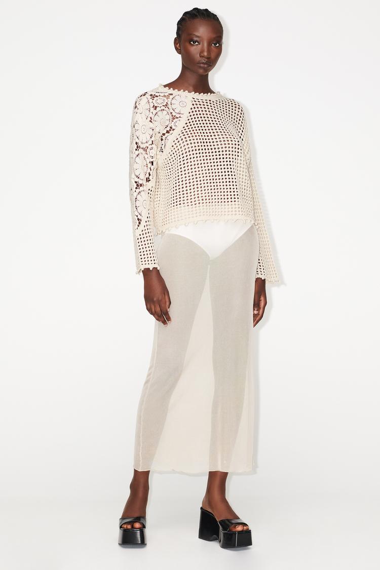 KNIT SWEATER WITH CONTRAST SLEEVES