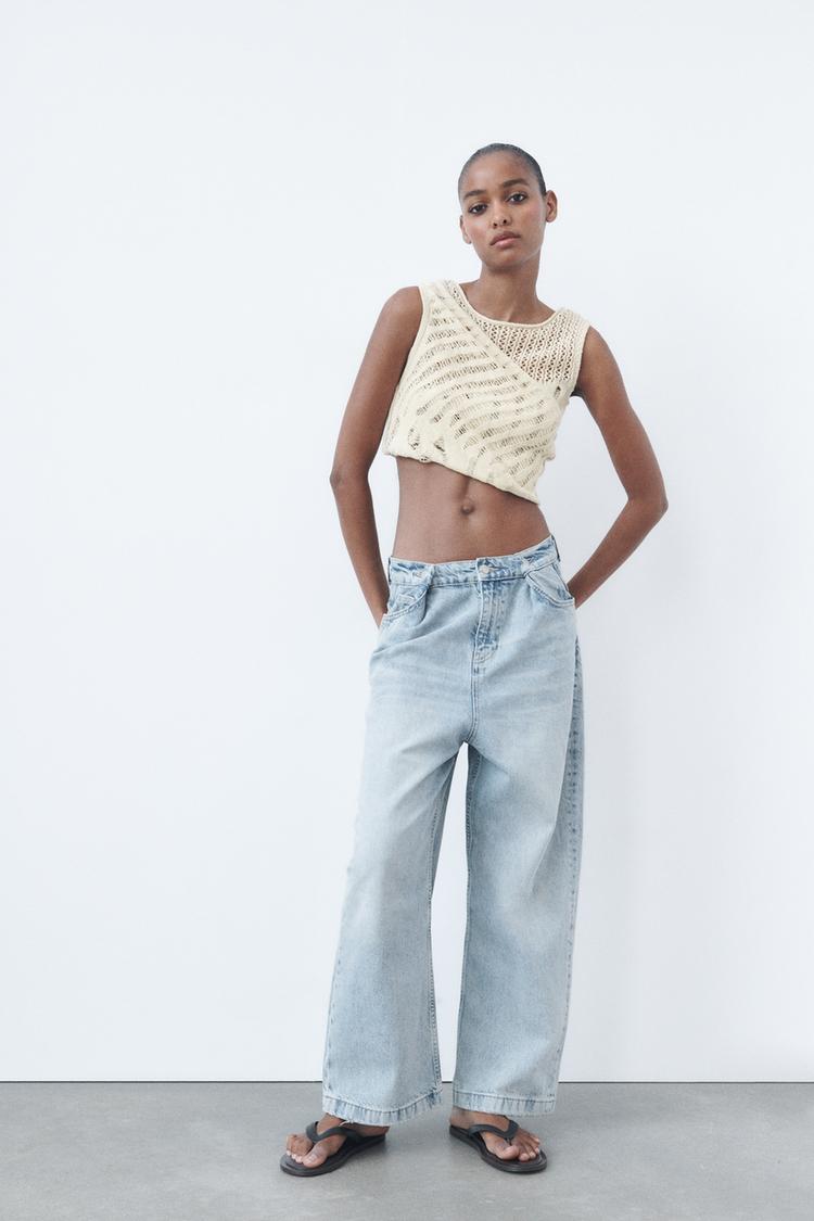 KNIT TOP WITH SIDE CUT-OUT DETAIL