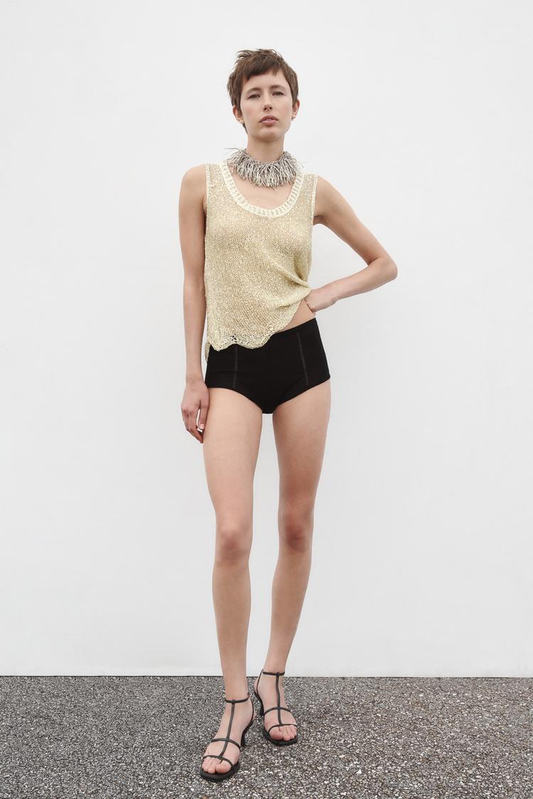 TOP WITH ASYMMETRIC HEM