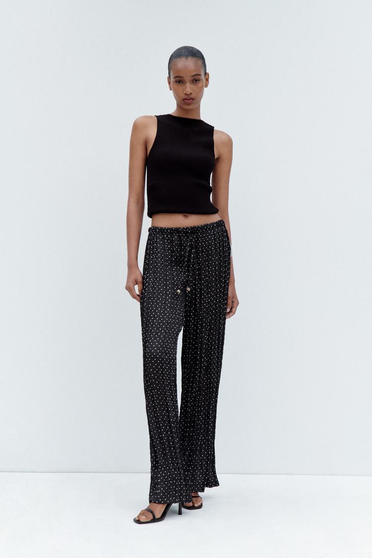CREASED-EFFECT WIDE-LEG POLKA DOT TROUSERS