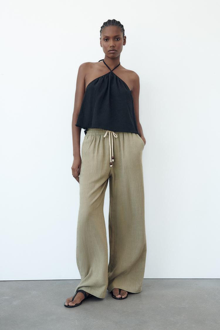 RUSTIC TROUSERS WITH ELASTICATED WAISTBAND