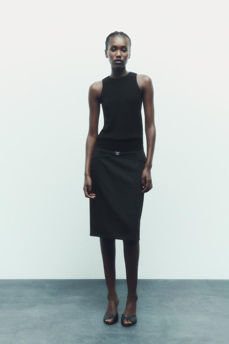 SLEEVELESS CABLE-KNIT TOP