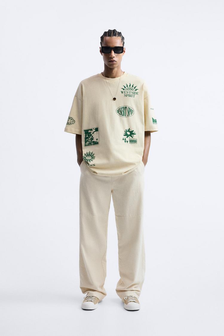 T-SHIRT WITH PRINTED GRAPHICS