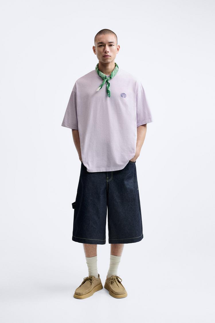 T-SHIRT WITH EMBROIDERED SLOGAN