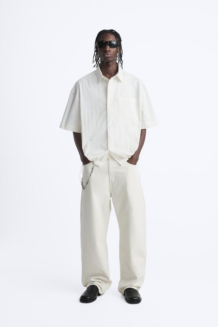 SHIRT WITH ADJUSTABLE HEM