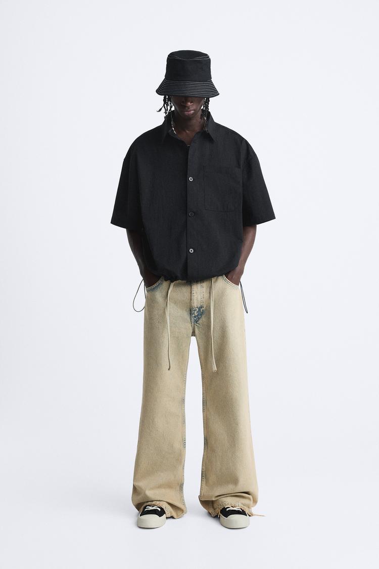 SHIRT WITH ADJUSTABLE HEM