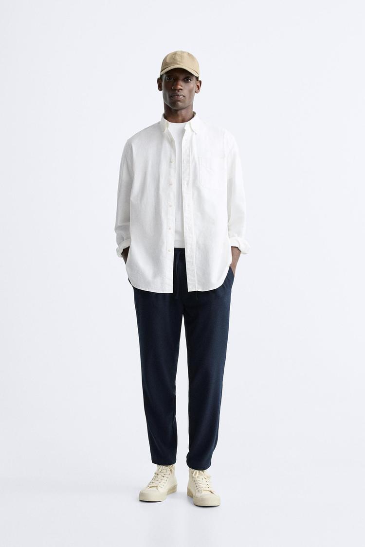 TEXTURED COTTON TROUSERS