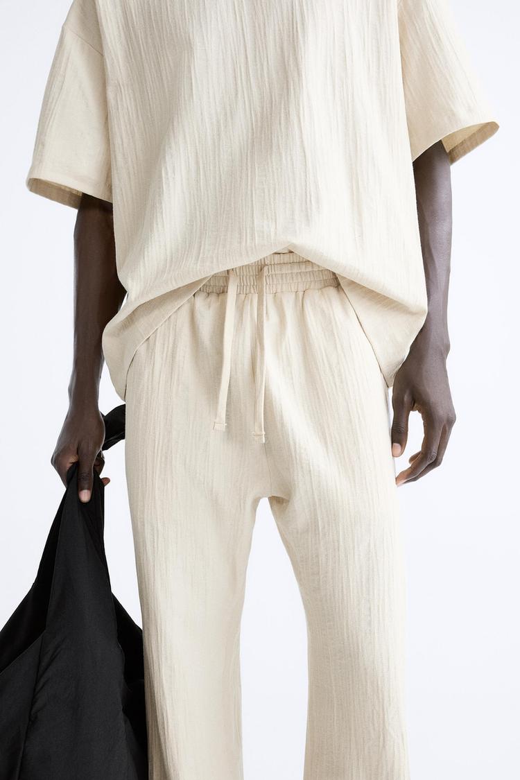 WIDE FIT TEXTURED TROUSERS