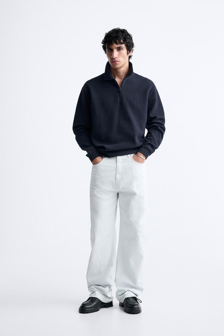 TEXTURED ZIP POLO SHIRT