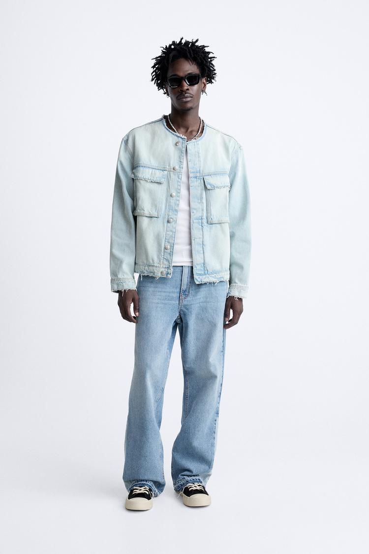 DENIM JACKET WITH IRREGULAR TRIMS