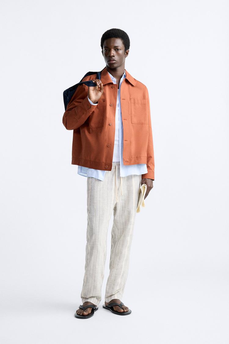 STRIPED TEXTURED TROUSERS