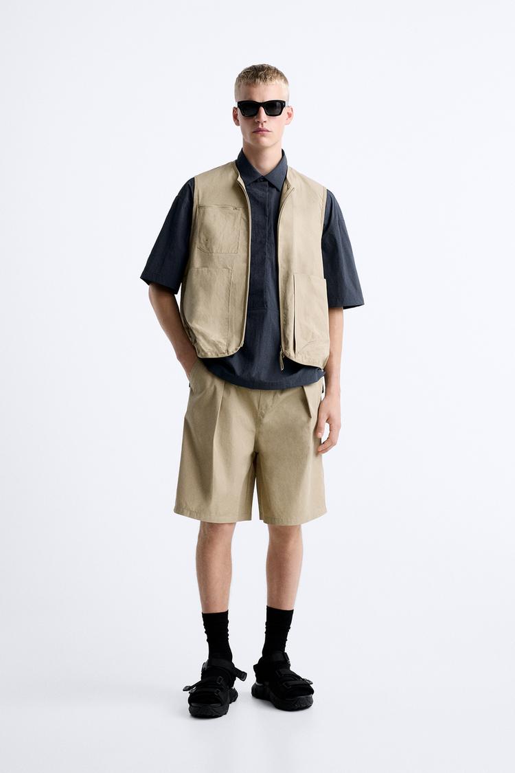 TECHNICAL GILET WITH POCKETS