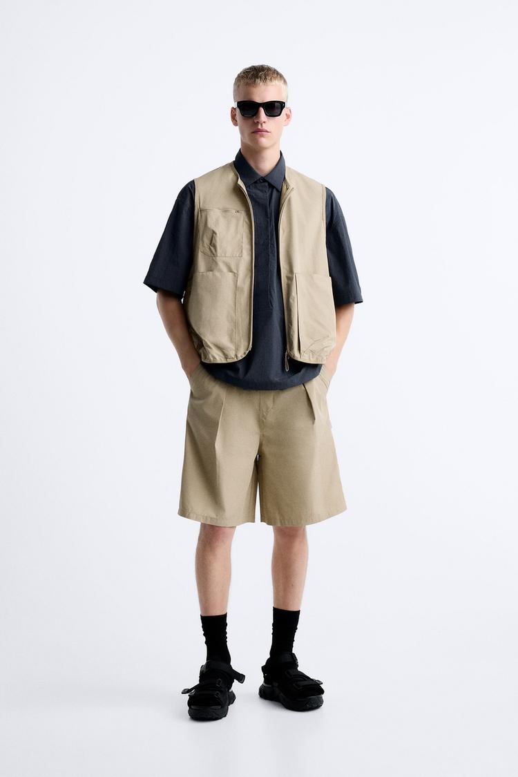 TECHNICAL BERMUDA SHORTS WITH CARPENTER POCKET