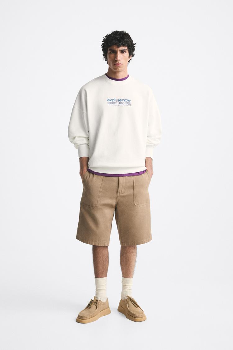 PRINTED SWEATSHIRT WITH SLOGAN