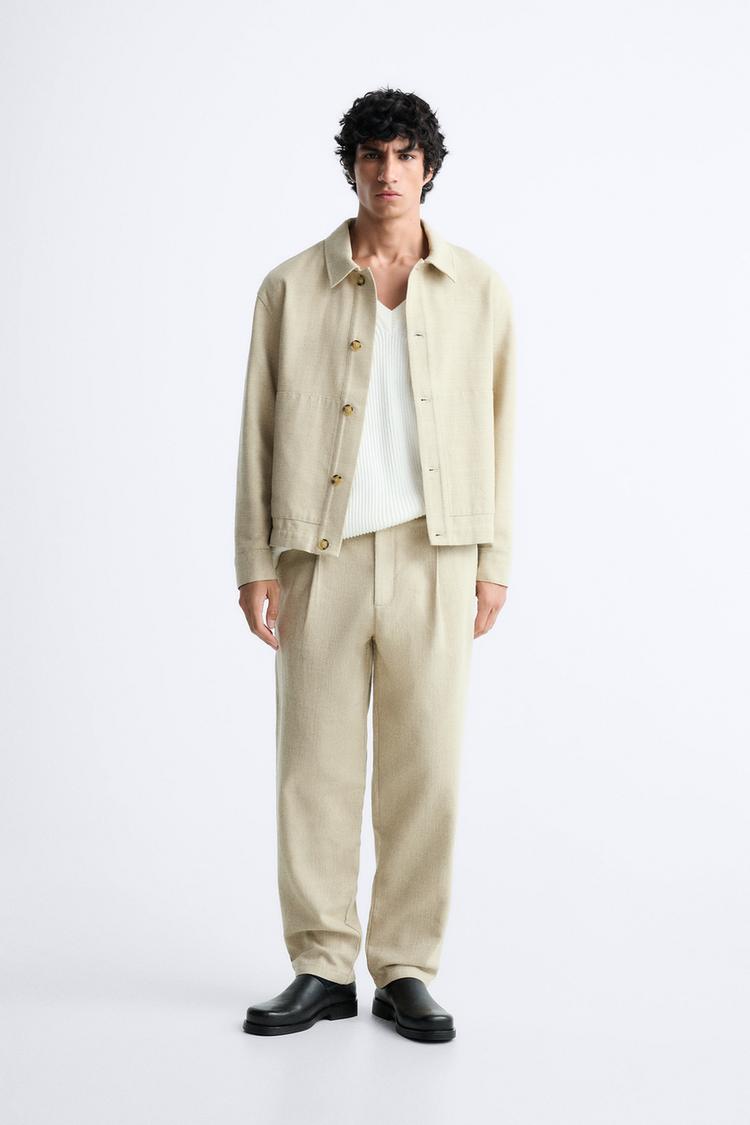 TEXTURED RUSTIC TROUSERS WITH PLEATS