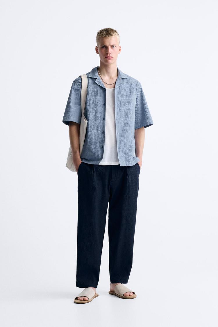 SEERSUCKER TROUSERS WITH PLEATS