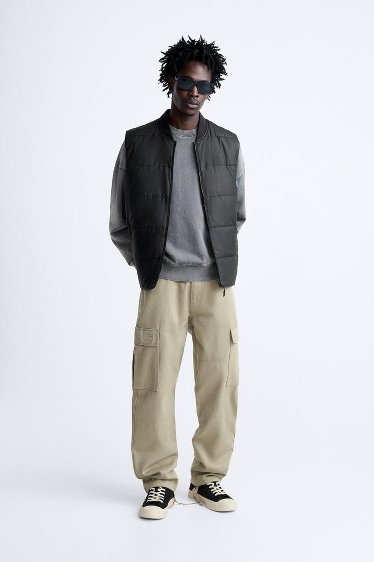 GILET WITH RUBBERISED FINISH