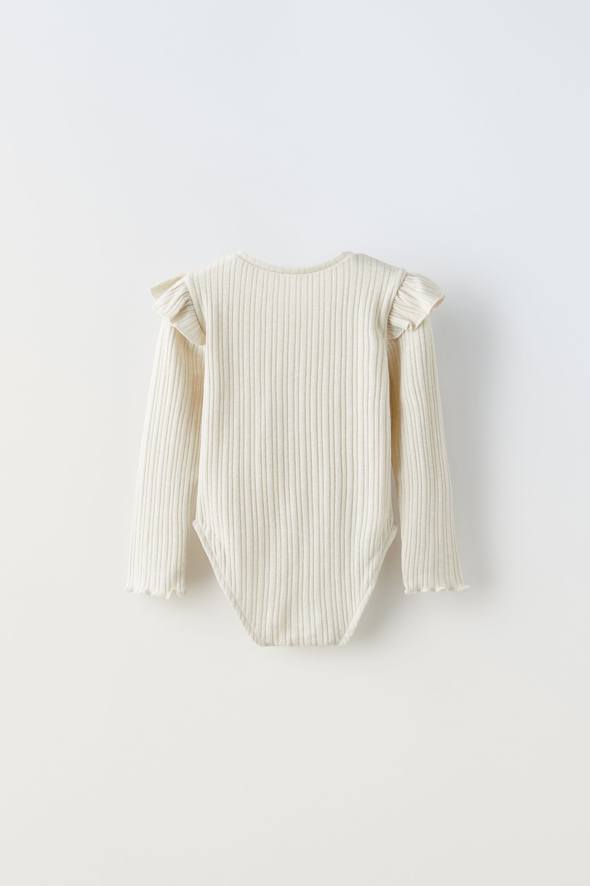 RIBBED BODYSUIT WITH RUFFLES