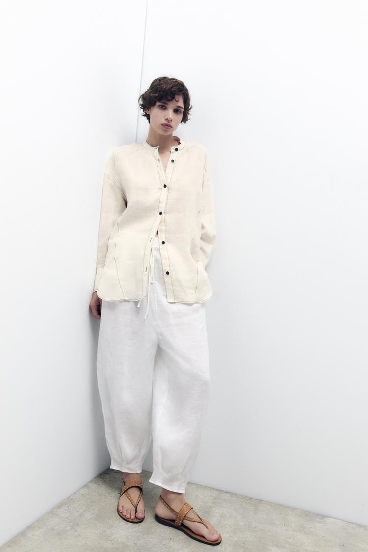 FLAT LEATHER SLIDER SANDALS WITH STUDS