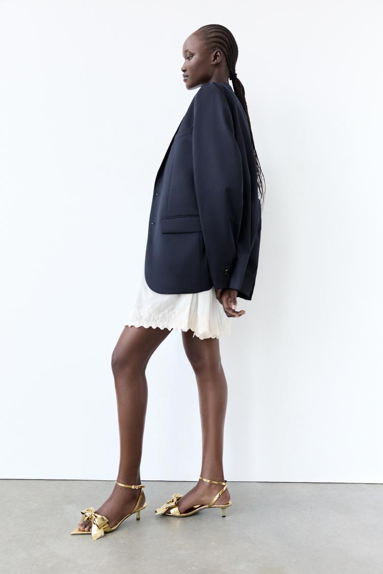 METALLIC SANDALS WITH BOW