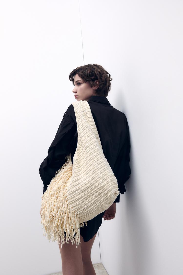 FRAYED FABRIC BUCKET BAG