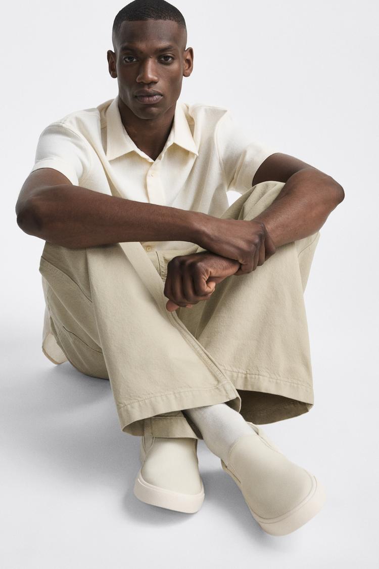 EMBOSSED LACELESS TRAINERS