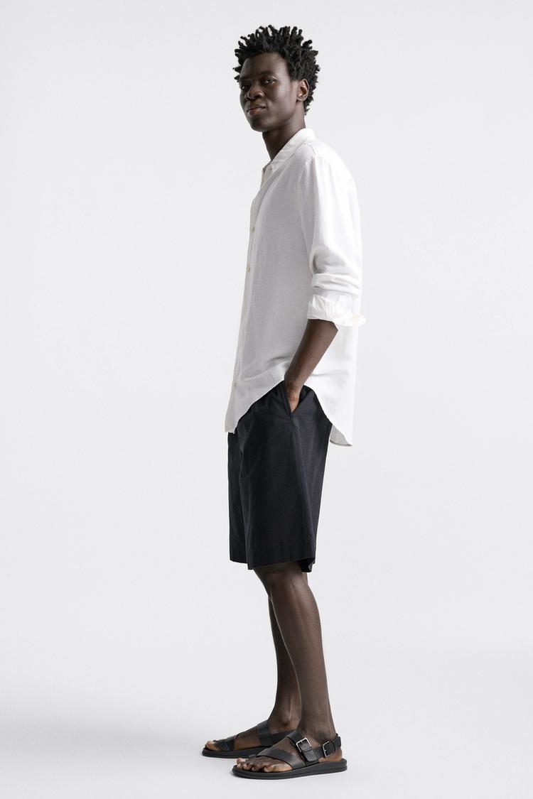 STRAPPY SANDALS WITH BUCKLE FASTENING