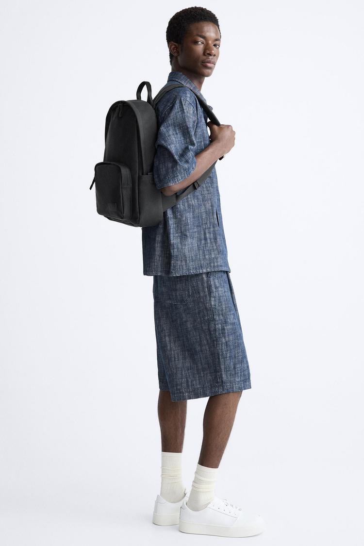 SLIM RUBBERISED BACKPACK