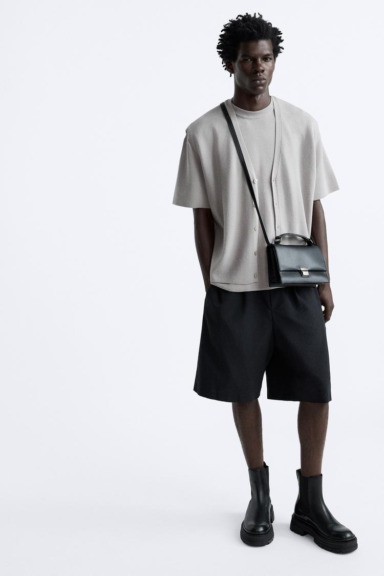 CROSSBODY BAG WITH METALLIC CLOSURE