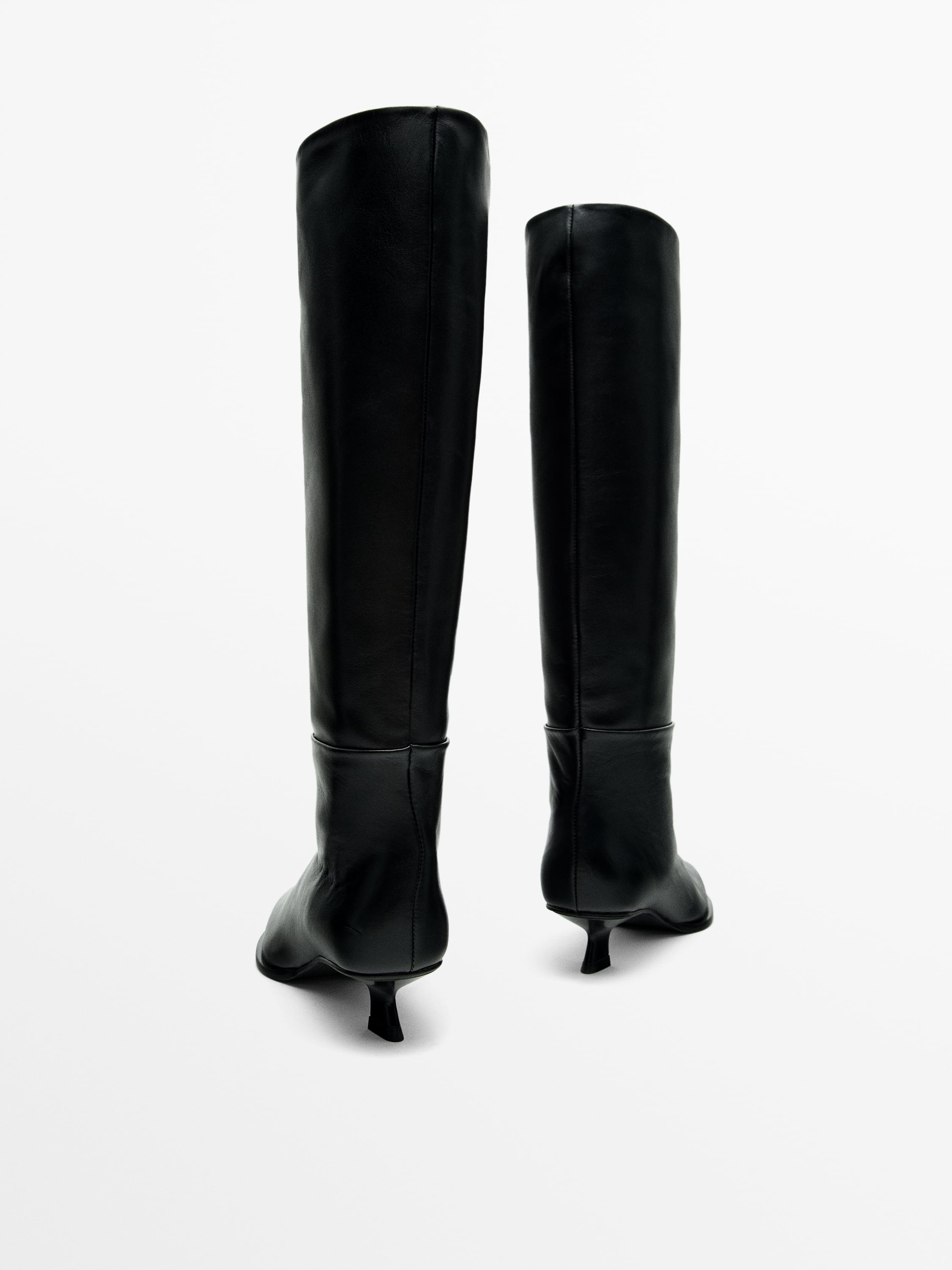 Heeled leather boots