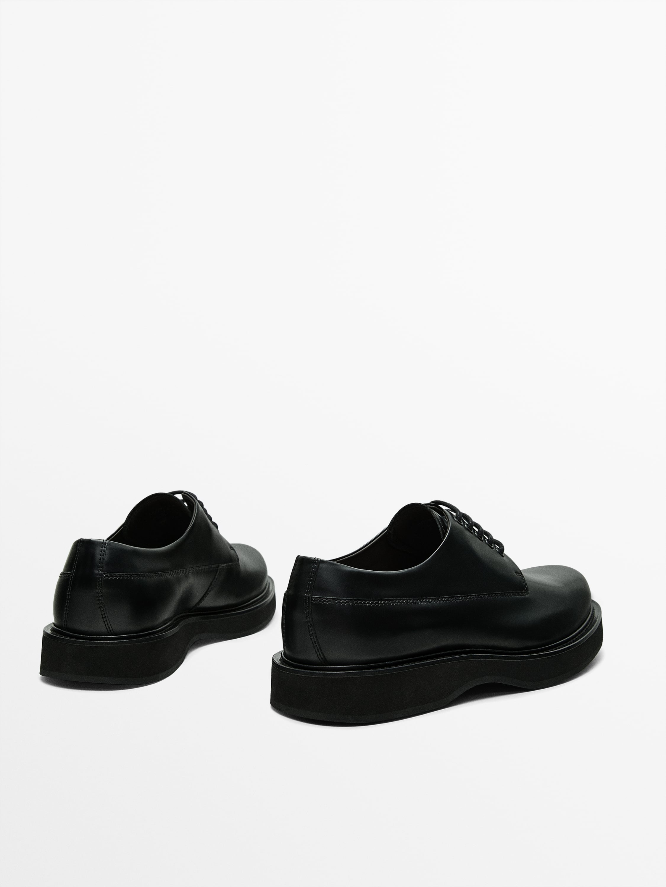 Black lace-up shoes