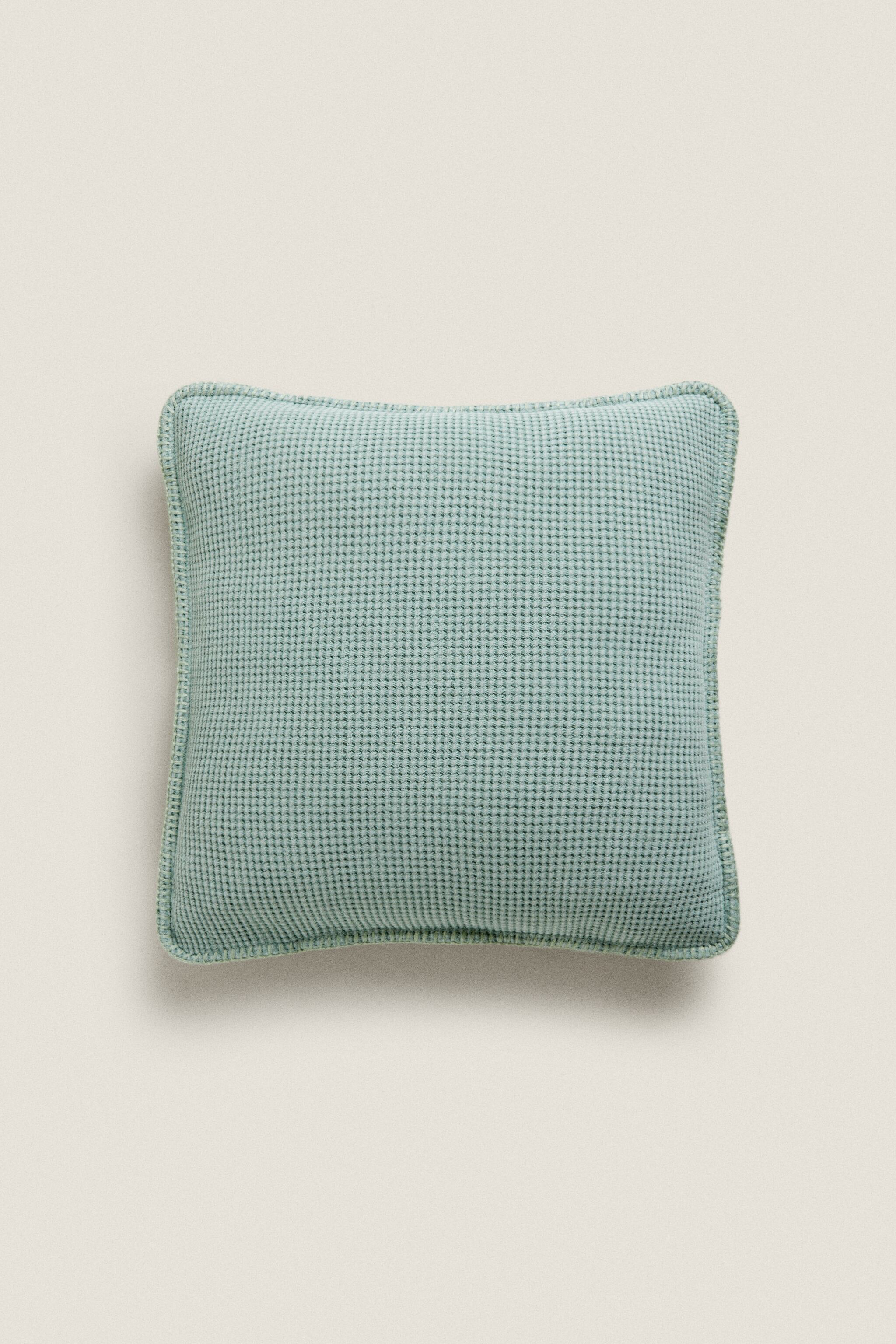 TEXTURED WAFFLE-KNIT CUSHION COVER