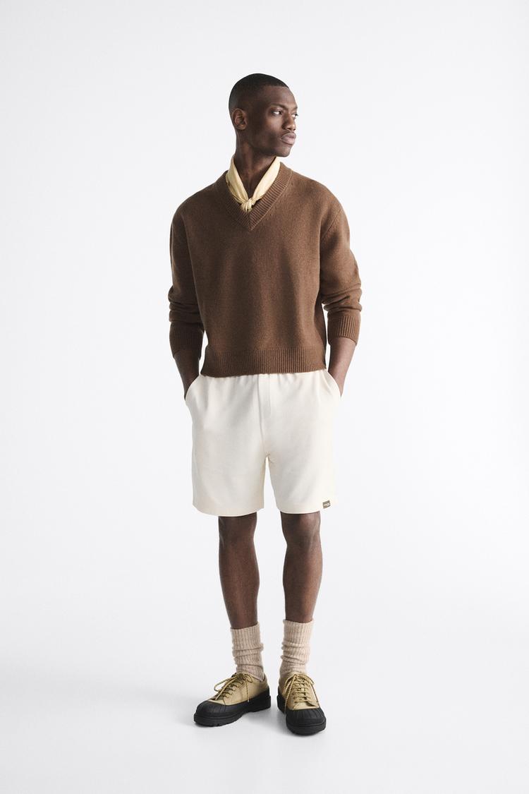 TEXTURED BERMUDA SHORTS WITH LABEL