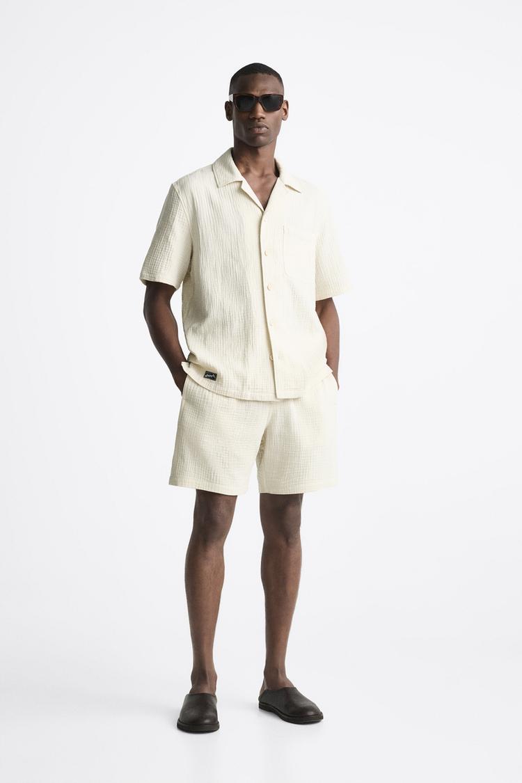 CREASED-EFFECT BERMUDA SHORTS