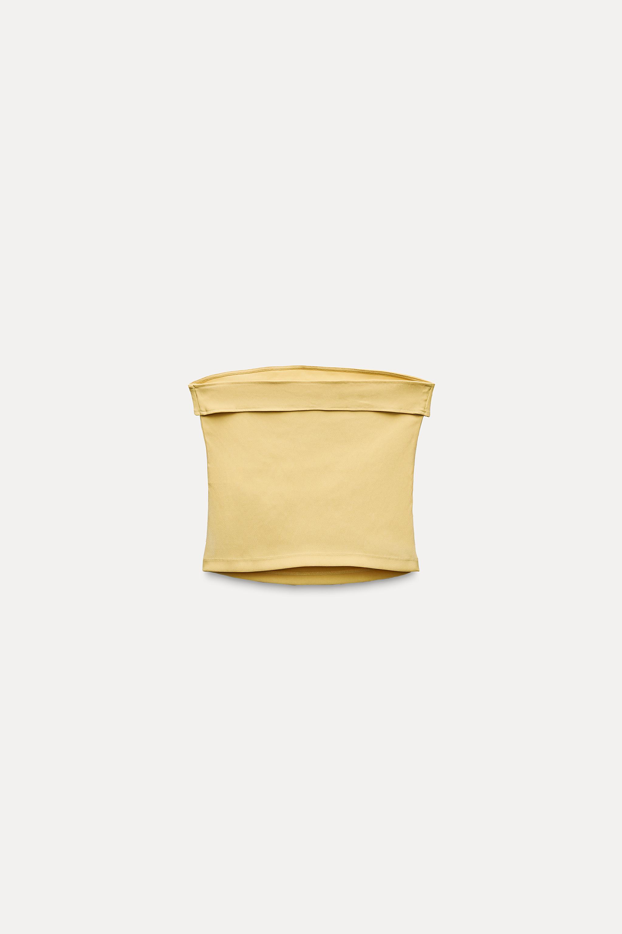 yellow buckle top