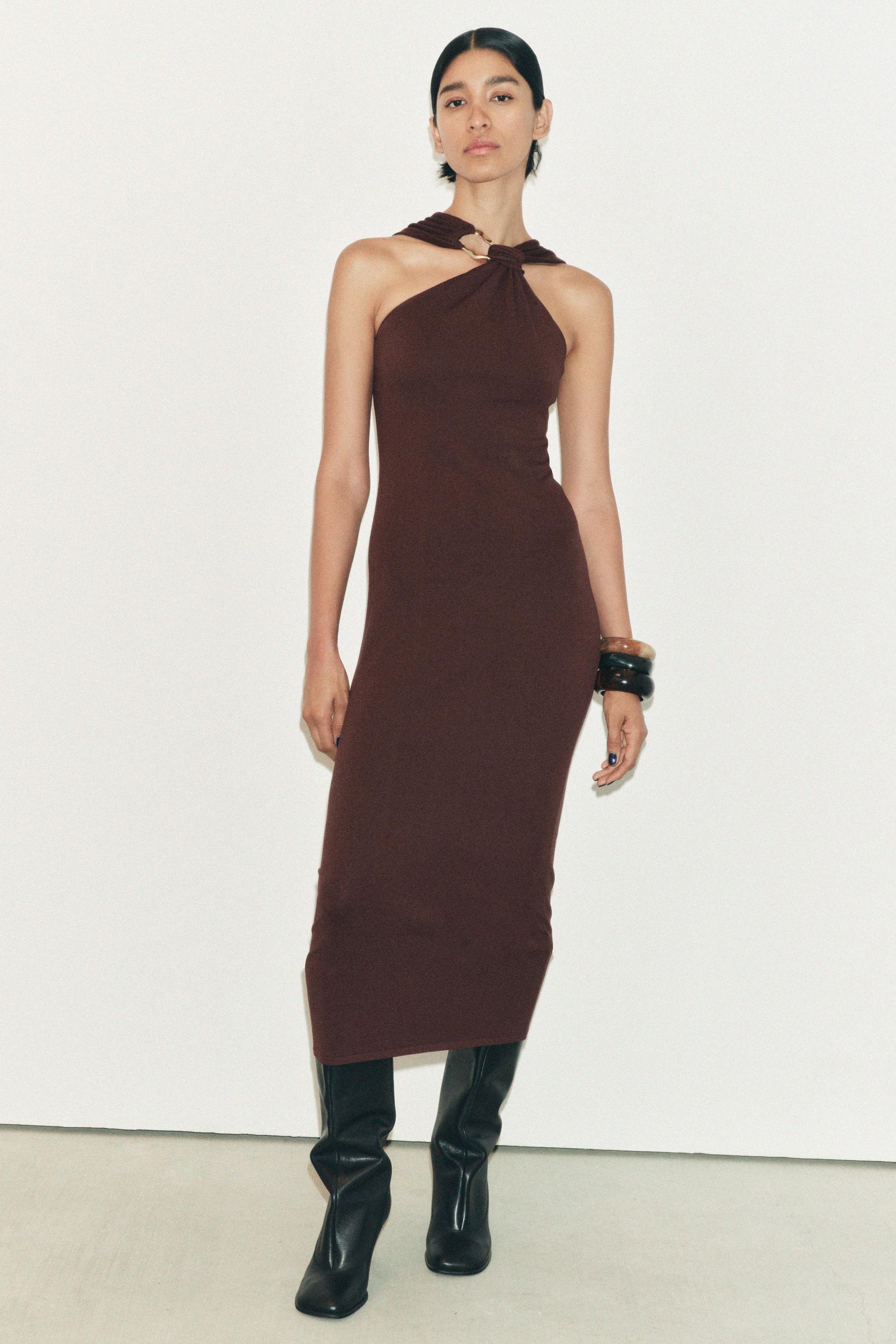 KNOTTED DRESS WITH GOLDEN APPLIQUÉ