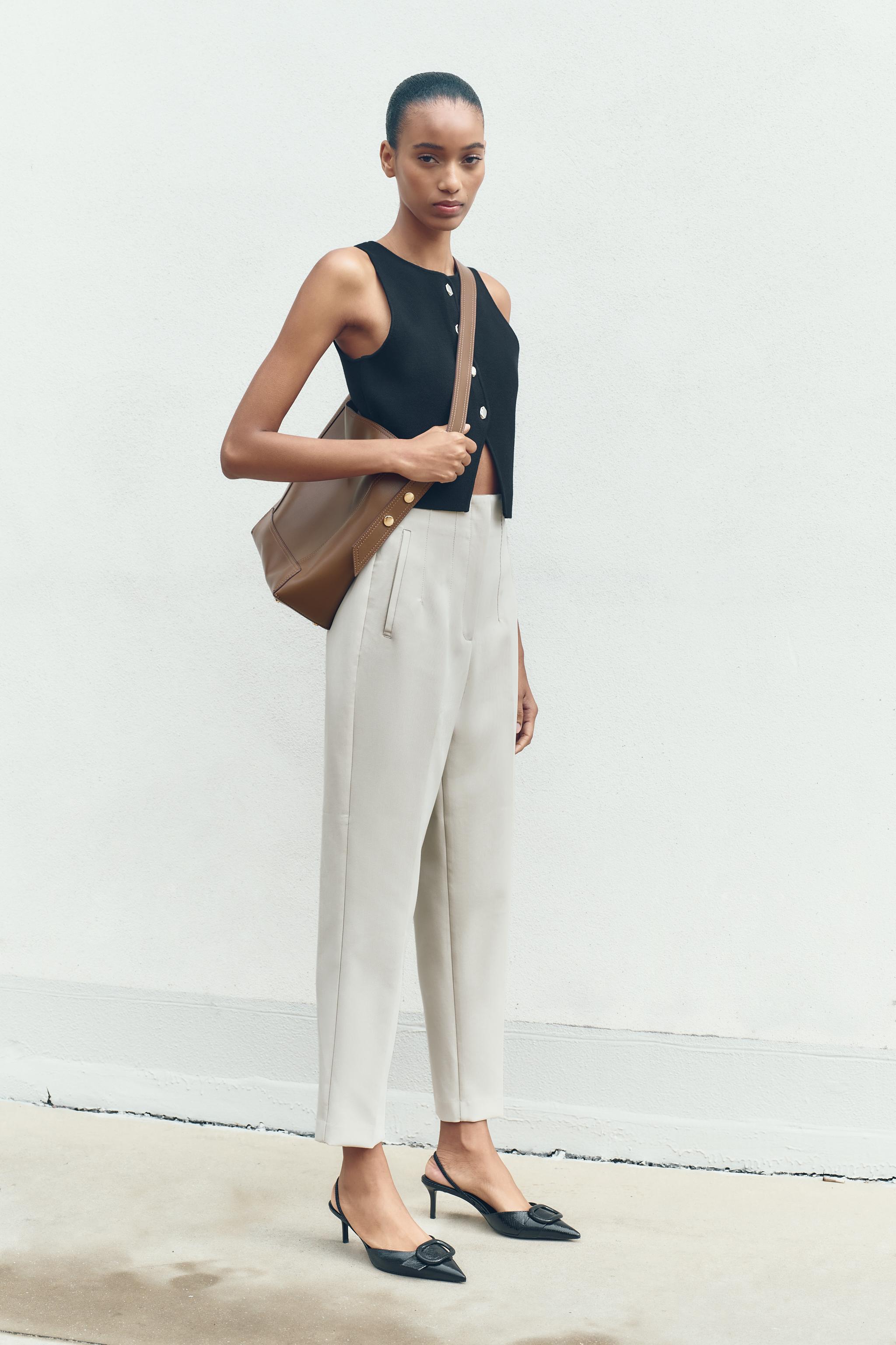 BUTTONED KNIT VEST