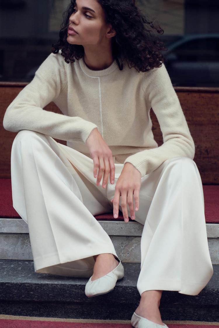 KNIT SWEATER WITH CONTRASTING PIPING