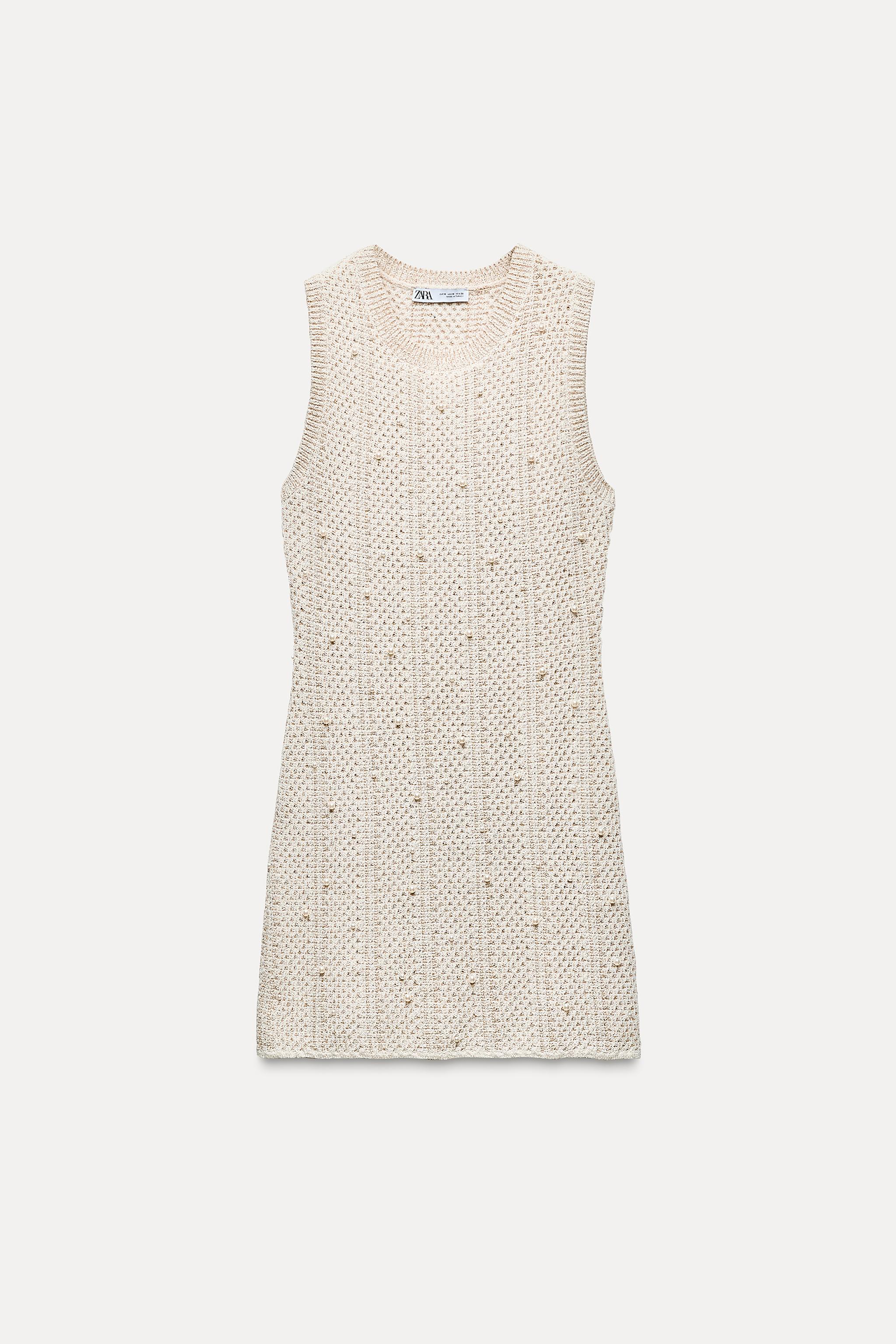 Compare KNIT DRESS WITH PEARL FRINGE | Mall of America Compare KNIT DRESS WITH PEARL FRINGE | Mall of America