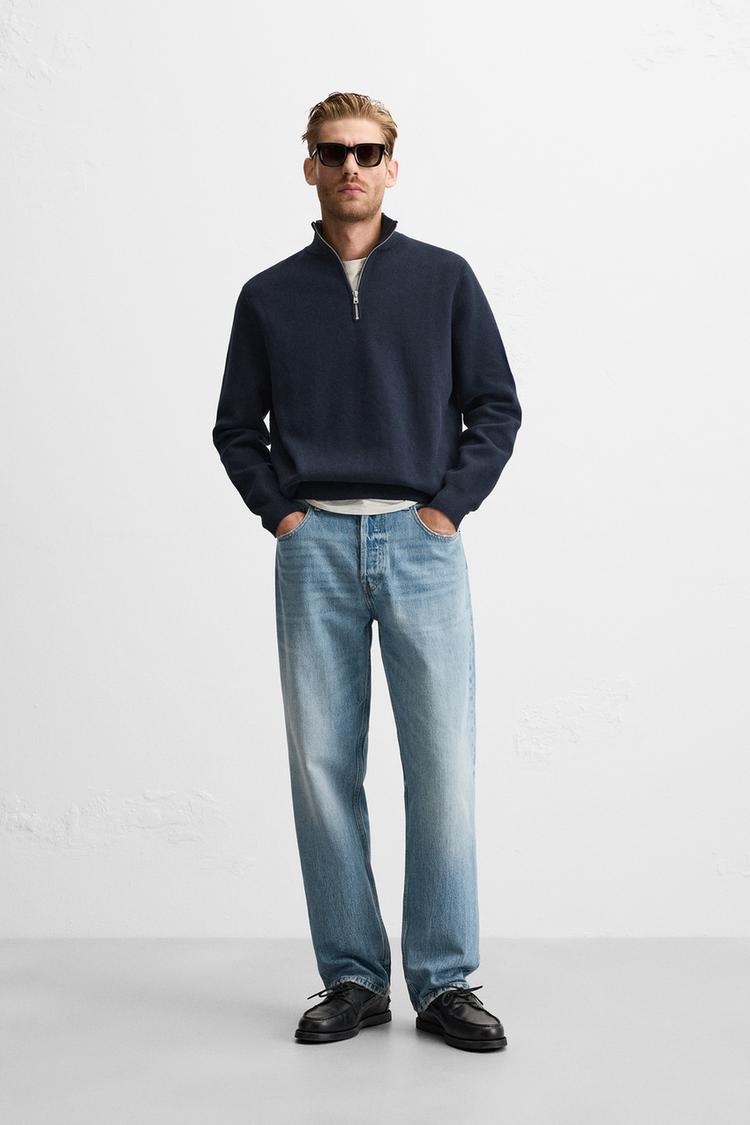 QUARTER ZIP SWEATER