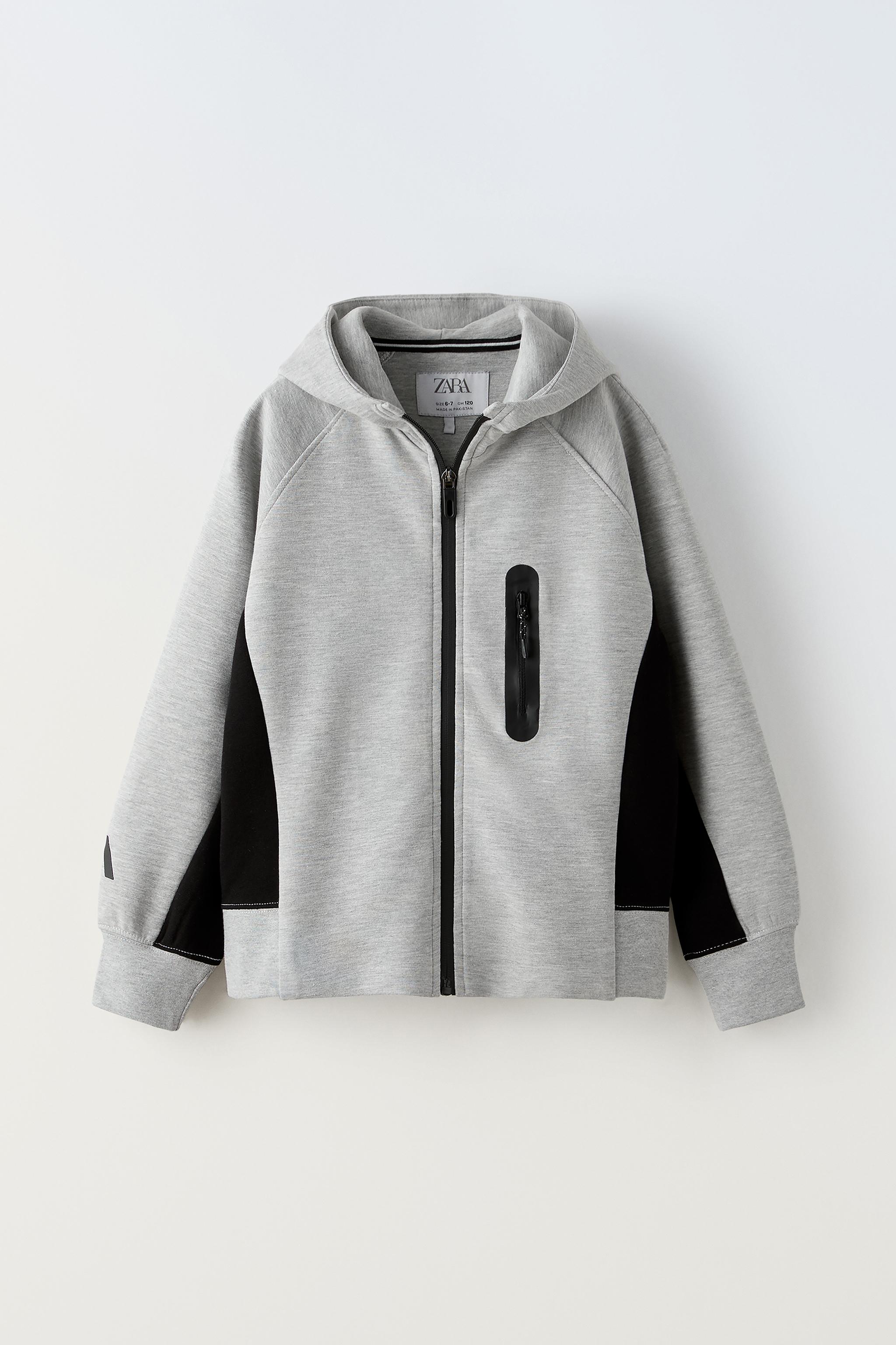 SPORTY ZIPPERED SWEATSHIRT