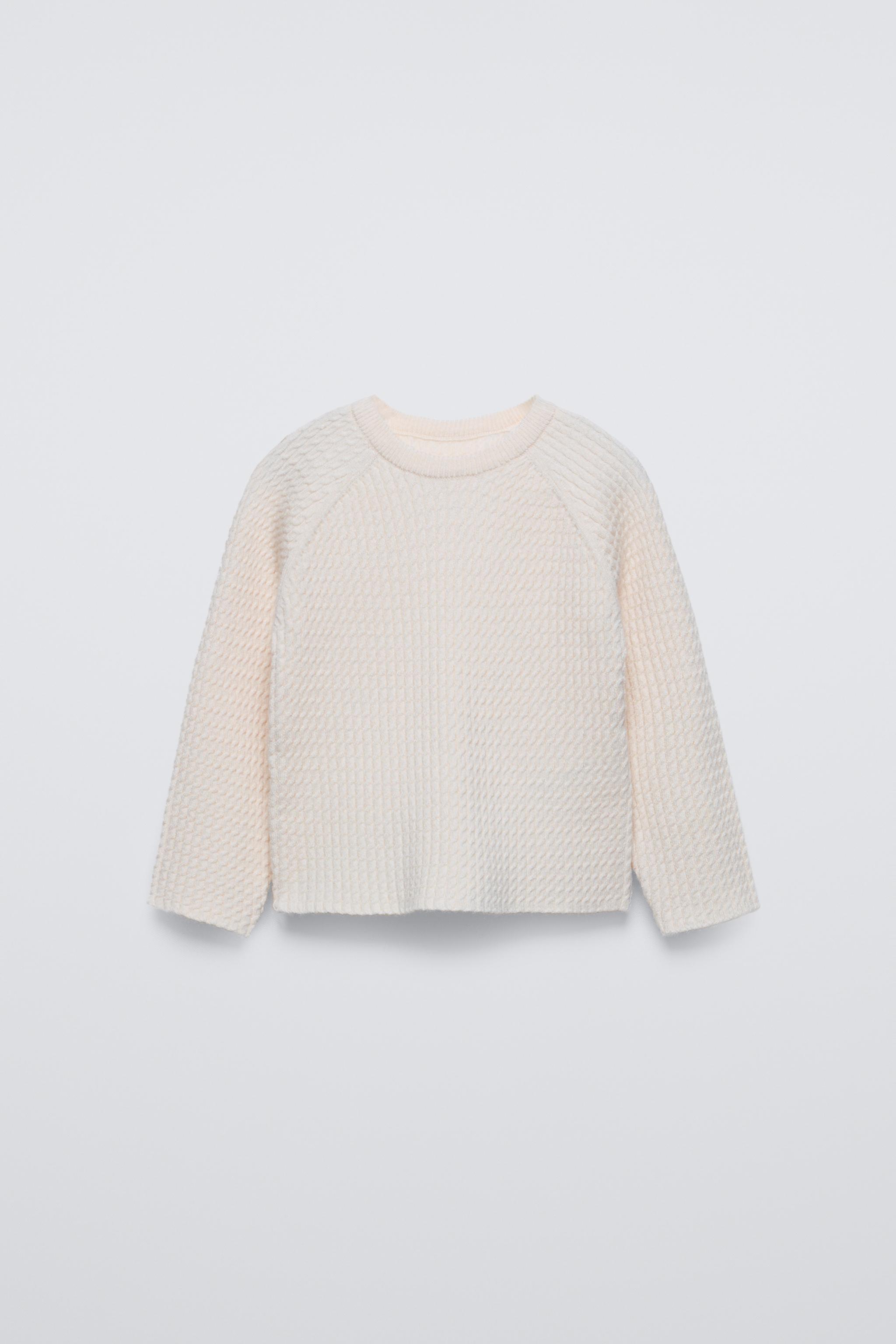 CABLE KNIT SWEATER