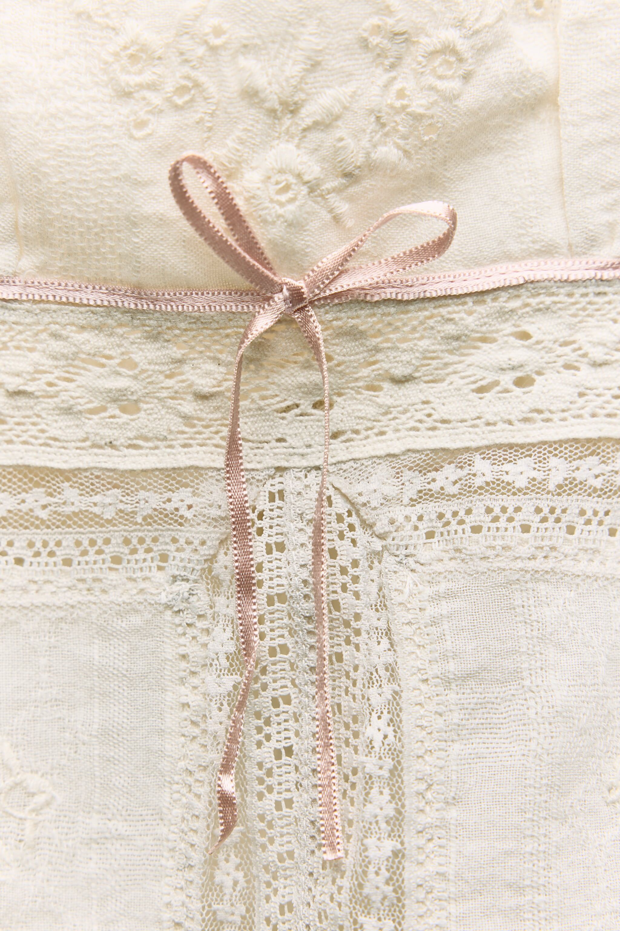 EMBROIDERED BOW TOP