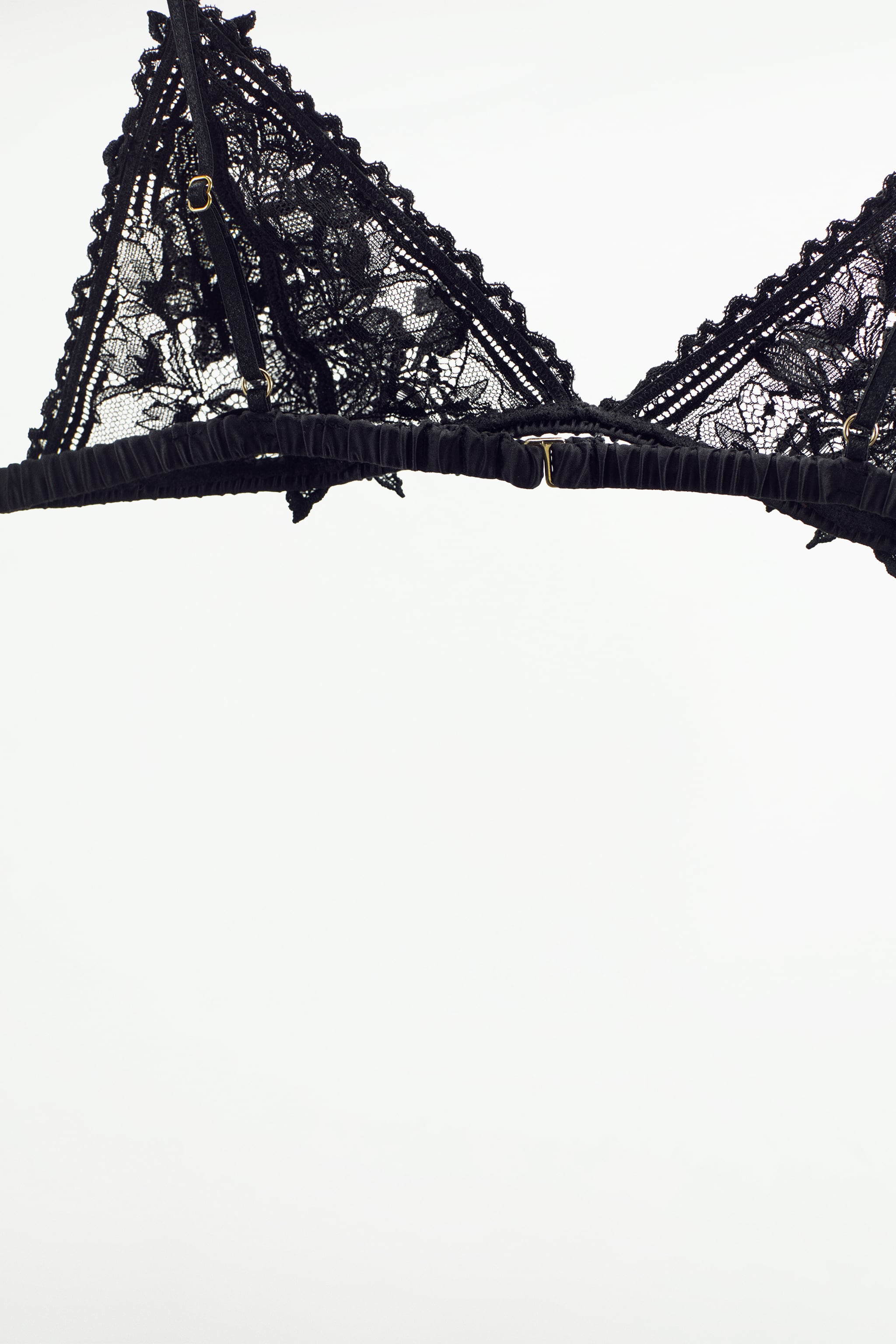 Triangle bralette with Lace fabric. trim. Adjustable thin straps. Back hook closure.