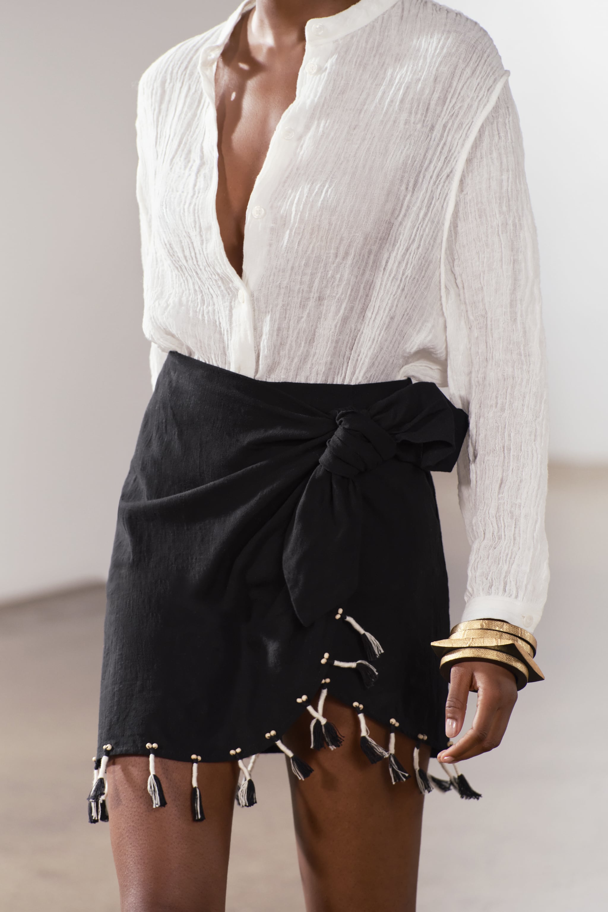 FRINGED WRAP FRONT COTTON SKIRT
