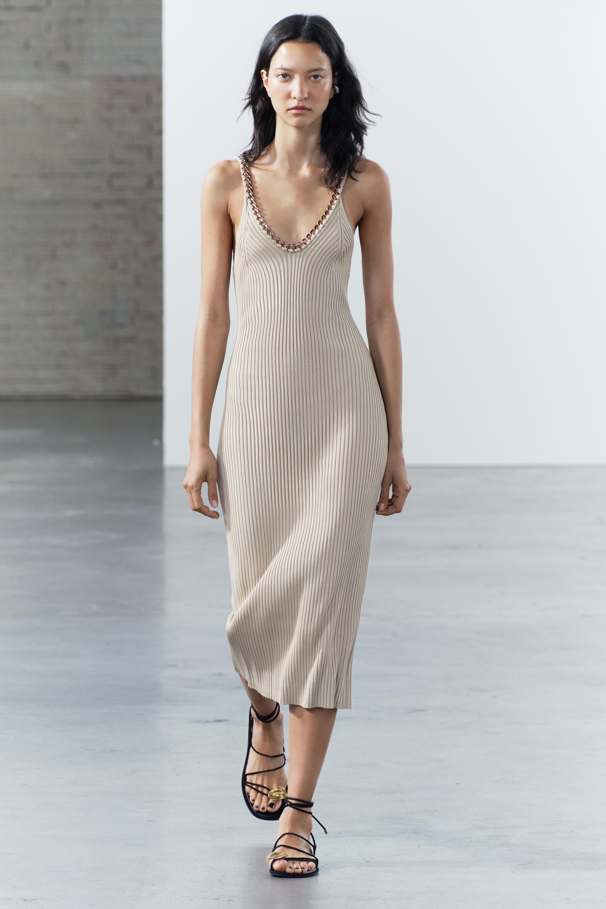 Compare CHAIN TRIM RIBBED KNIT MIDI DRESS | Mall of America Compare CHAIN TRIM RIBBED KNIT MIDI DRESS | Mall of America