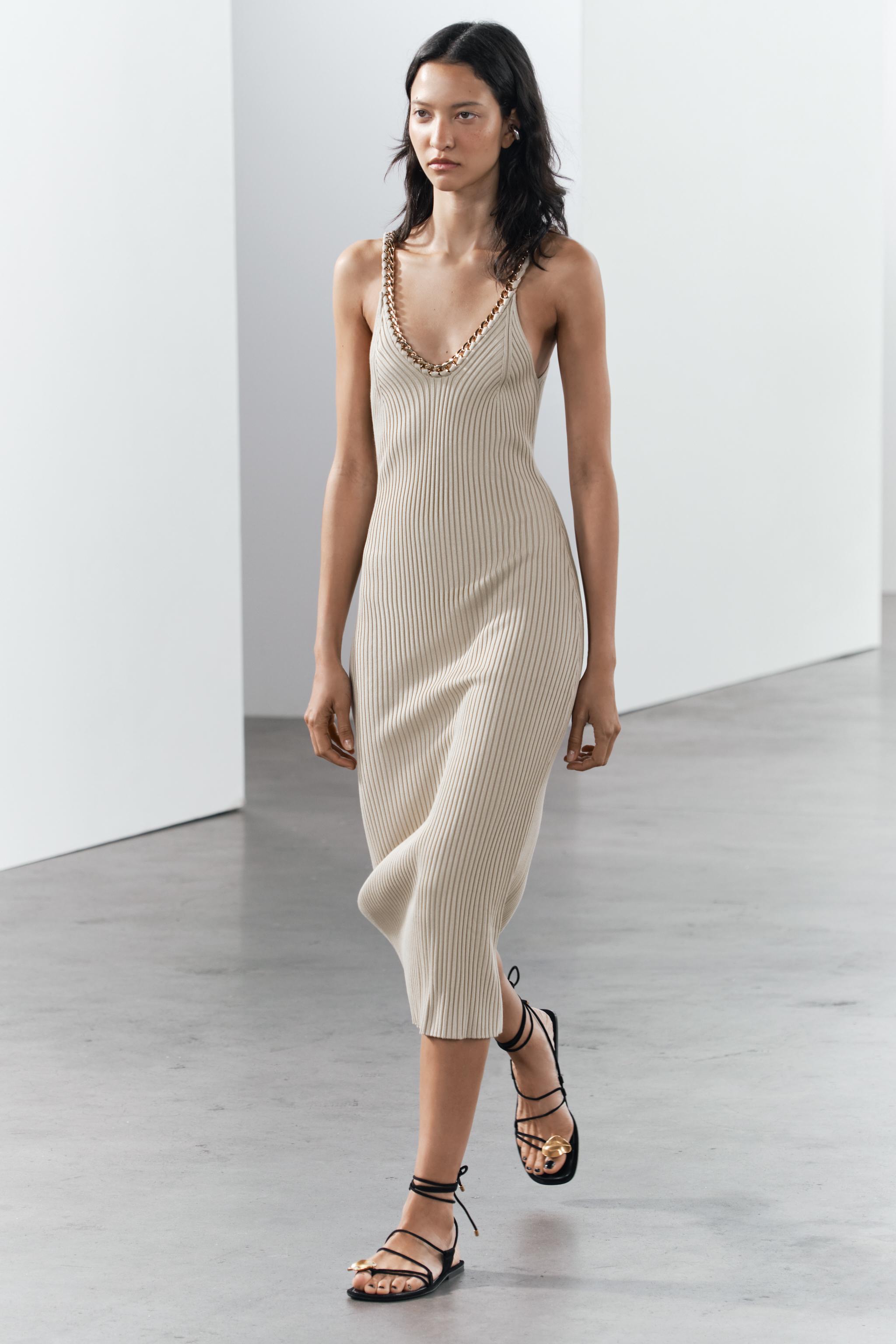 Compare CHAIN TRIM RIBBED KNIT MIDI DRESS | Mall of America Compare CHAIN TRIM RIBBED KNIT MIDI DRESS | Mall of America